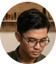 desainer produksi topi drumband